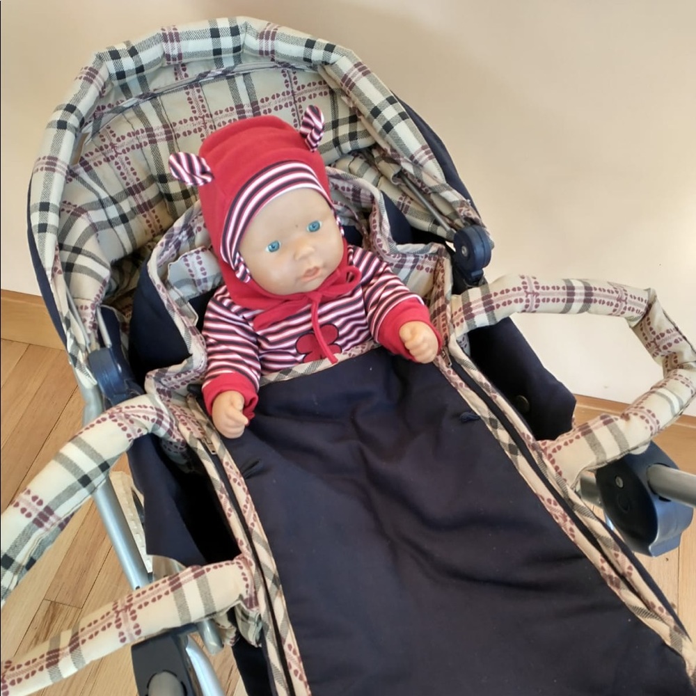 Baby carriage, doll, and change of clothes!